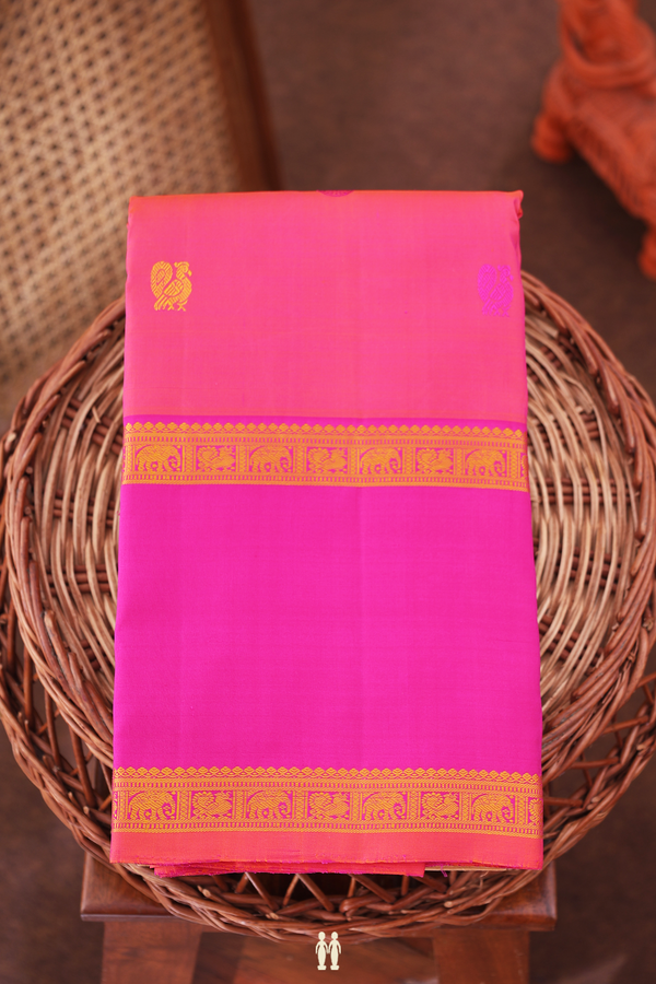 Kanchipuram Silk Saree In Coral Pink With Peacock Buttas