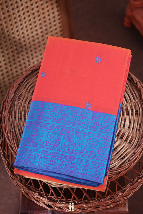 Kanchipuram Silk Saree In Coral Pink With Peacock Buttas