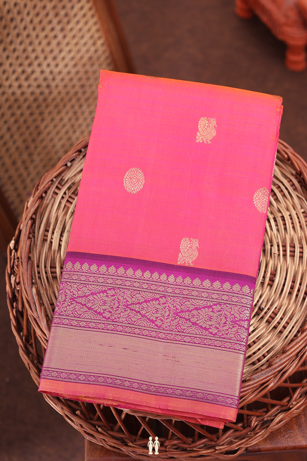 Kanchipuram Silk Saree In Coral Pink With Peacock Buttas