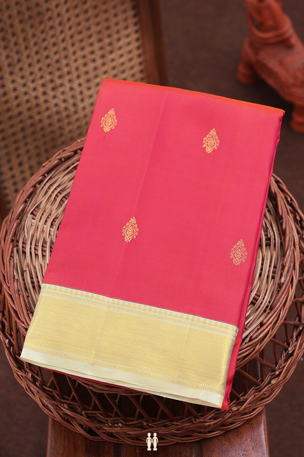 Kanchipuram Silk Saree In Coral Pink With Zari Buttas