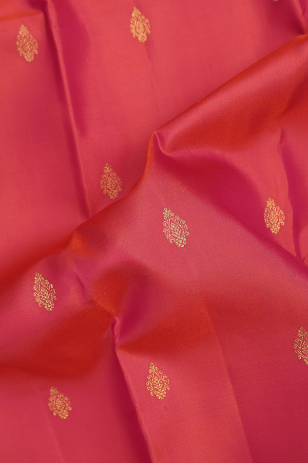Kanchipuram Silk Saree In Coral Pink With Zari Buttas