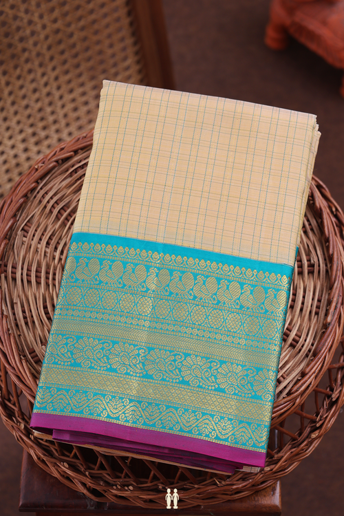 Kanchipuram Silk Saree In Cream Color With Checks Design