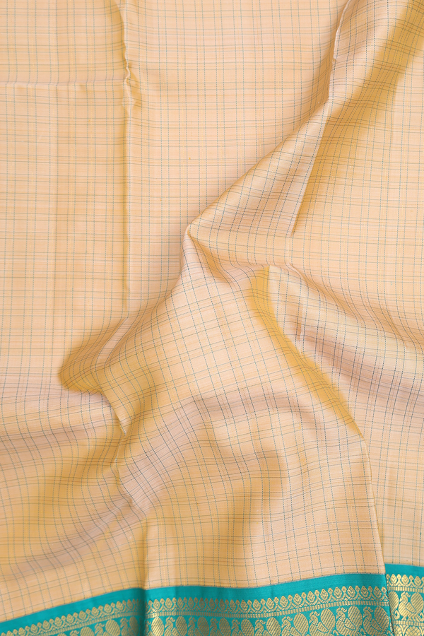 Kanchipuram Silk Saree In Cream Color With Checks Design