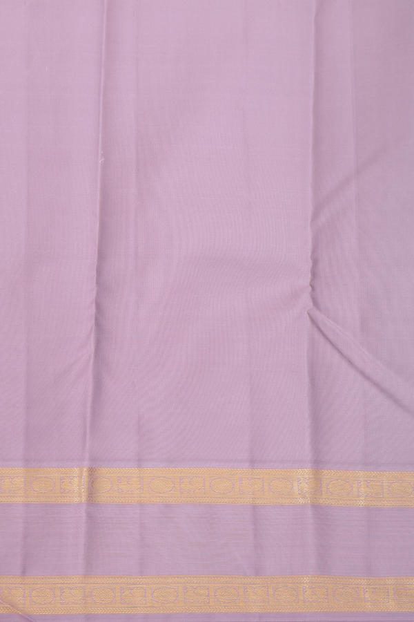 Kanchipuram Silk Saree In Cream Color With Paisley Buttas