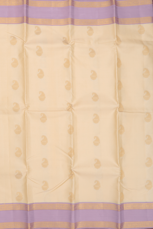 Kanchipuram Silk Saree In Cream Color With Paisley Buttas