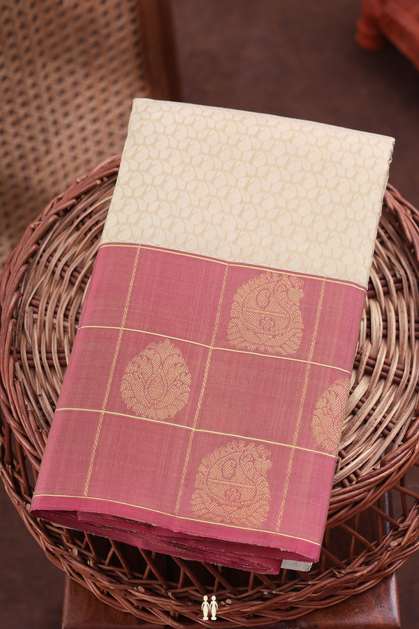 Kanchipuram Silk Saree In Cream Color With Paisley Design