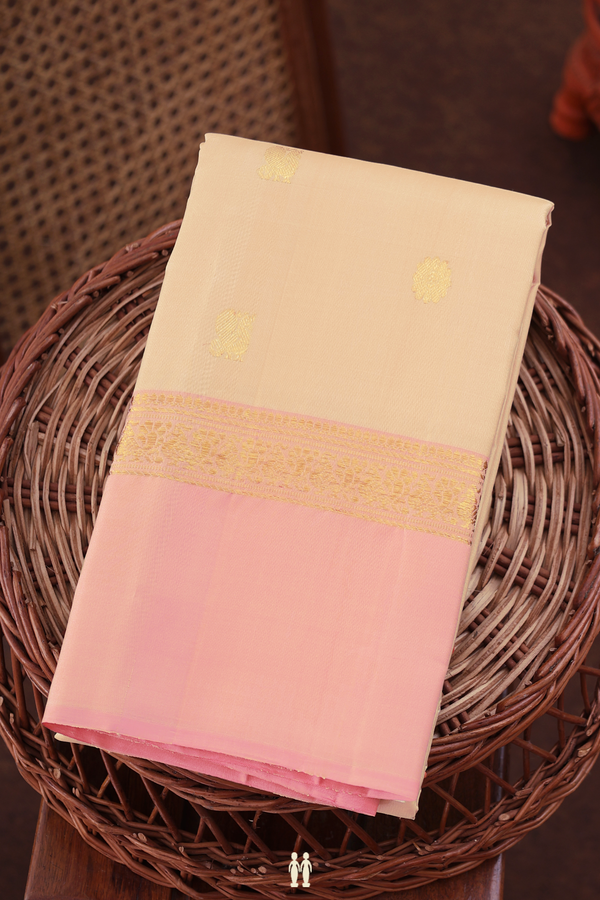 Kanchipuram Silk Saree In Cream Color With Peacock Buttas