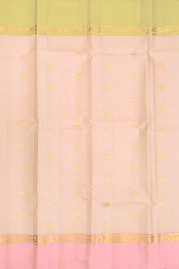 Kanchipuram Silk Saree In Cream Color With Peacock Buttas