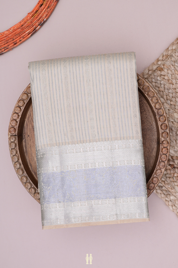 Kanchipuram Silk Saree In Cream Color With Stripes Design