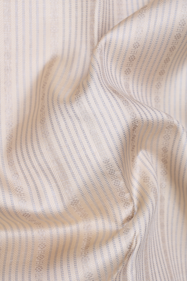 Kanchipuram Silk Saree In Cream Color With Stripes Design