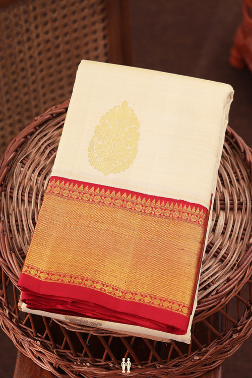 Kanchipuram Silk Saree In Cream Color With Zari Motifs