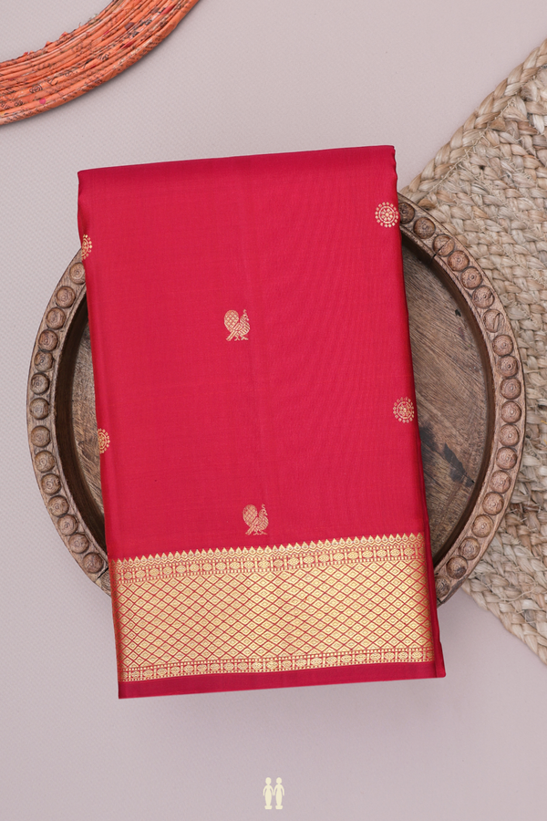 Kanchipuram Silk Saree In Crimson Red With Peacock Buttas