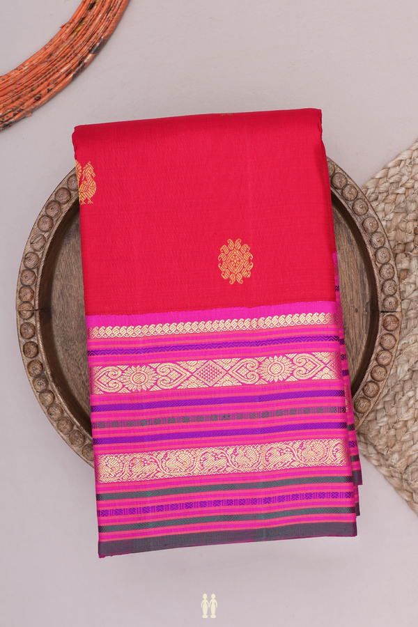 Kanchipuram Silk Saree In Crimson Red With Peacock Buttas