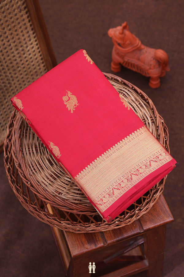 Kanchipuram Silk Saree In Crimson Red With Peacock Buttas