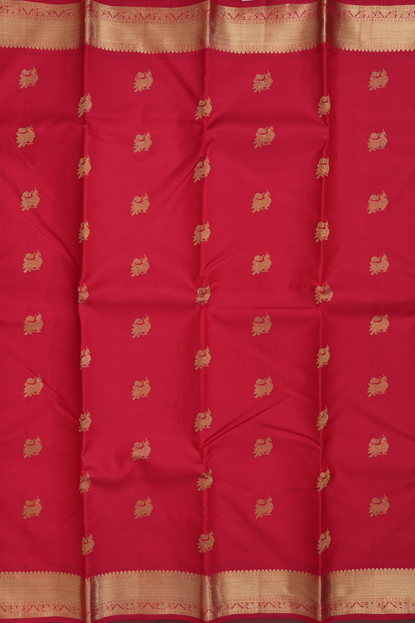 Kanchipuram Silk Saree In Crimson Red With Peacock Buttas