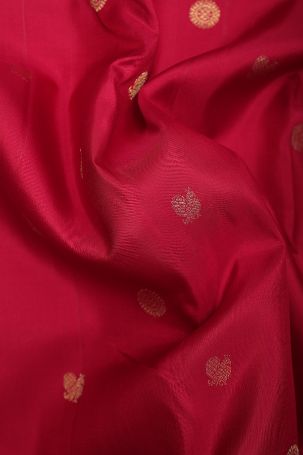 Kanchipuram Silk Saree In Crimson Red With Peacock Buttas