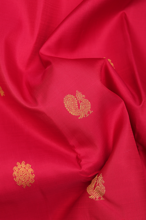 Kanchipuram Silk Saree In Crimson Red With Peacock Buttas