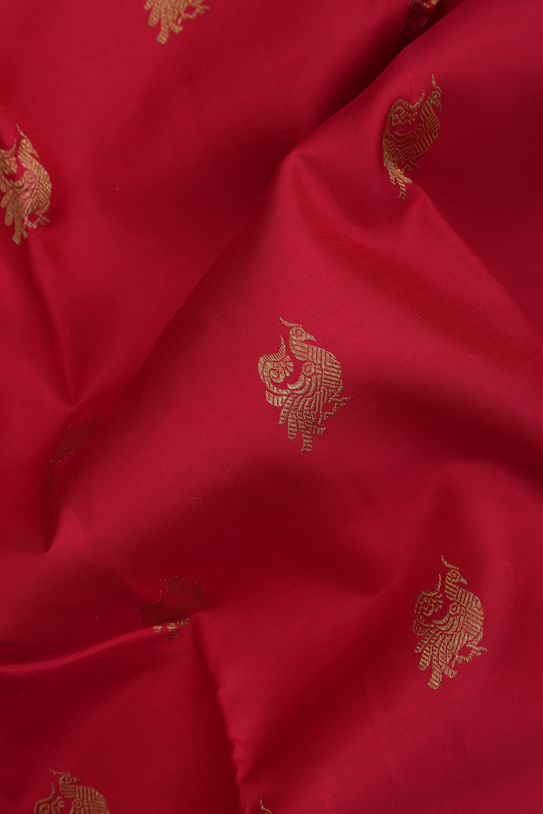 Kanchipuram Silk Saree In Crimson Red With Peacock Buttas