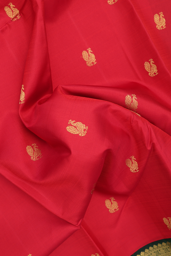 Kanchipuram Silk Saree In Crimson Red With Peacock Buttas