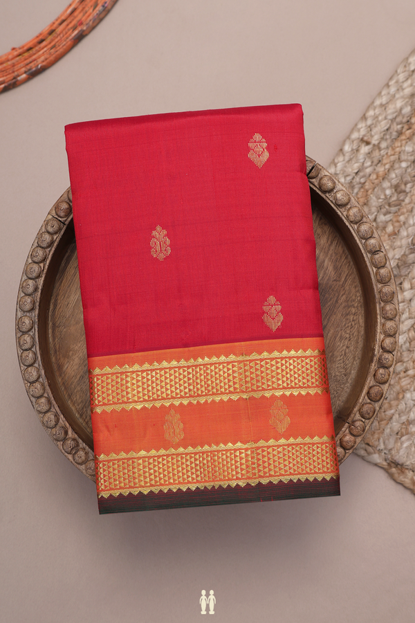 Kanchipuram Silk Saree In Crimson Red With Zari Buttas