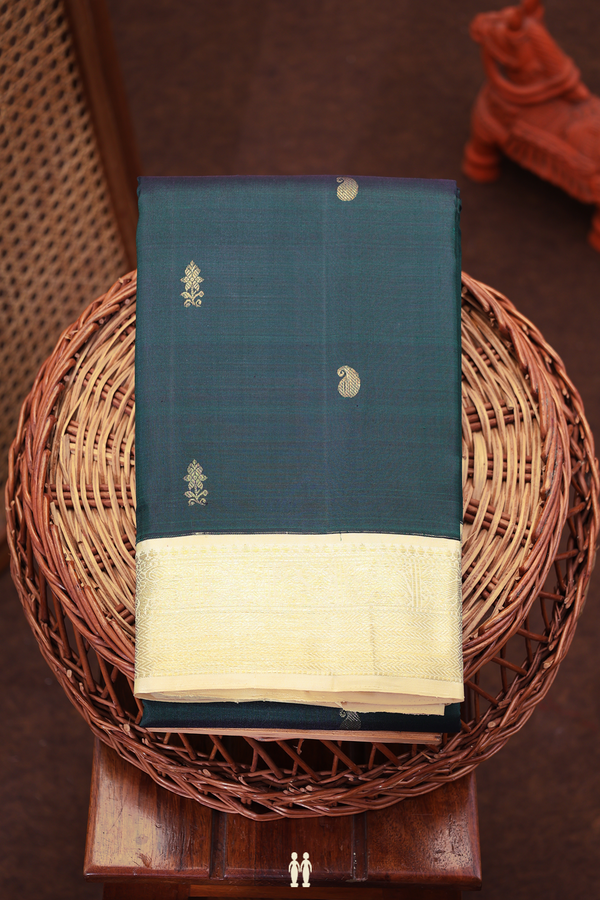 Kanchipuram Silk Saree In Dark Green With Paisley Buttas