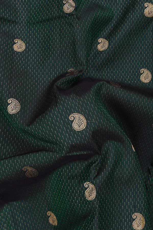 Kanchipuram Silk Saree In Dark Green With Paisley Buttas