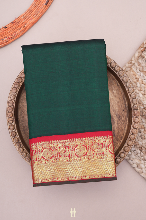 Kanchipuram Silk Saree In Dark Green With Peacock Border