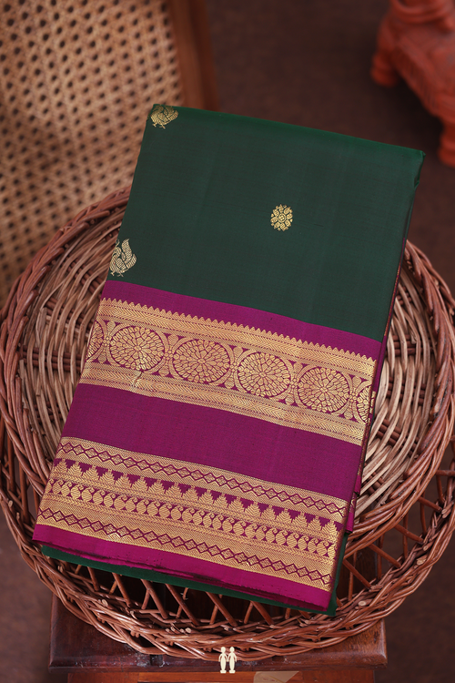 Kanchipuram Silk Saree In Dark Green With Peacock Buttas