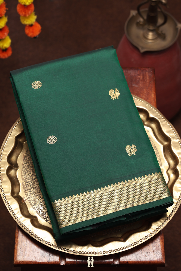 Kanchipuram Silk Saree In Dark Green With Peacock Buttas
