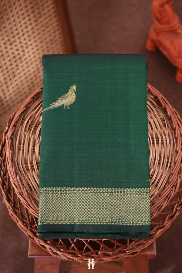 Kanchipuram Silk Saree In Dark Green With Peacock Buttas