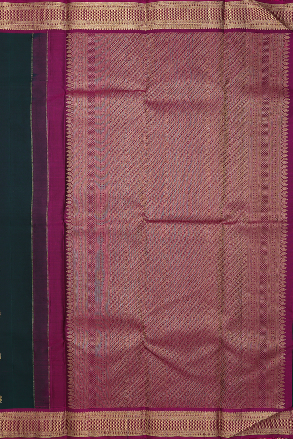 Kanchipuram Silk Saree In Dark Green With Peacock Buttas