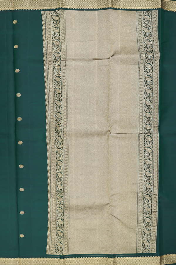 Kanchipuram Silk Saree In Dark Green With Peacock Buttas