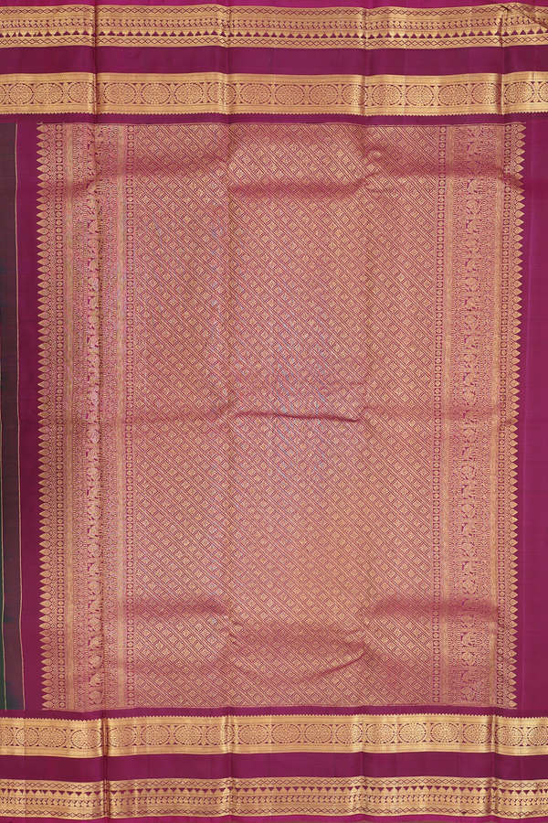 Kanchipuram Silk Saree In Dark Green With Peacock Buttas