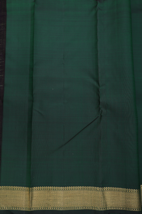 Kanchipuram Silk Saree In Dark Green With Peacock Buttas