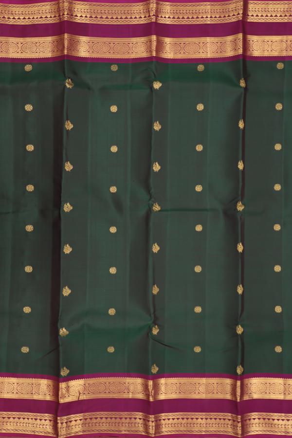 Kanchipuram Silk Saree In Dark Green With Peacock Buttas