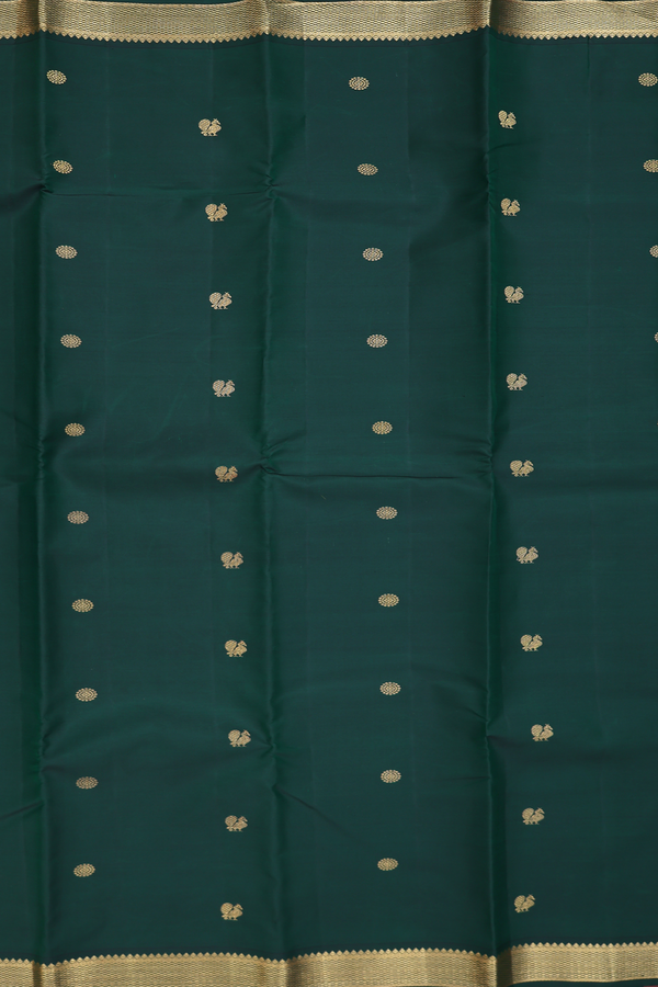 Kanchipuram Silk Saree In Dark Green With Peacock Buttas