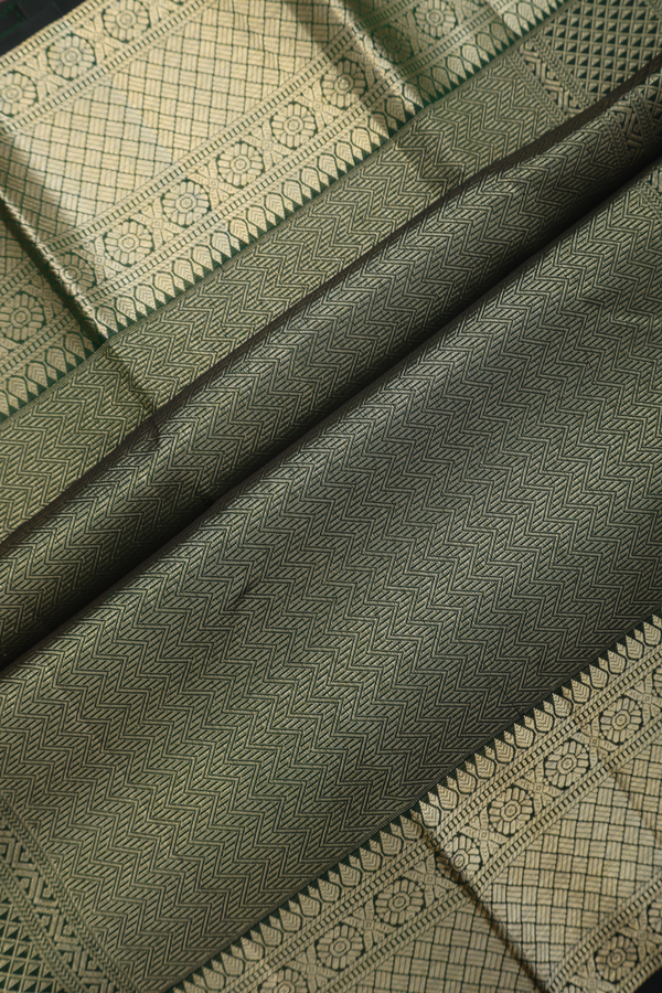 Kanchipuram Silk Saree In Dark Green With Peacock Buttas