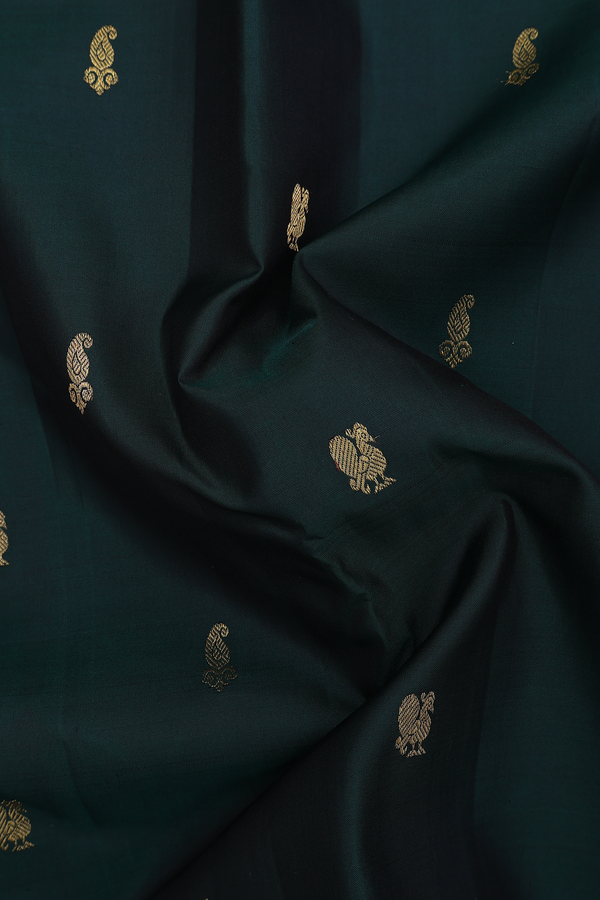 Kanchipuram Silk Saree In Dark Green With Peacock Buttas