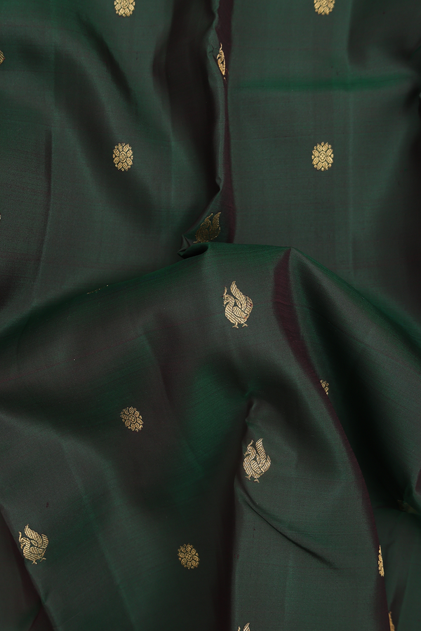 Kanchipuram Silk Saree In Dark Green With Peacock Buttas