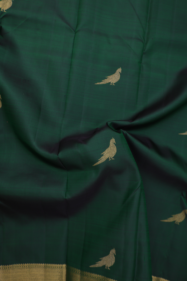 Kanchipuram Silk Saree In Dark Green With Peacock Buttas