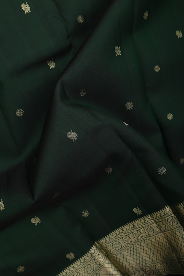 Kanchipuram Silk Saree In Dark Green With Peacock Buttas