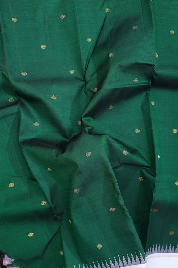 Kanchipuram Silk Saree In Dark Green With Zari Buttas