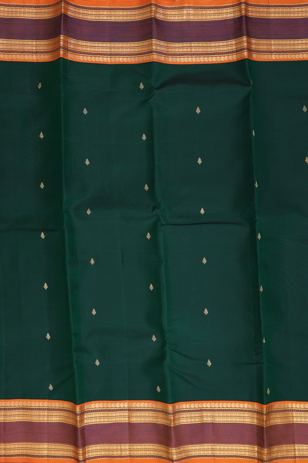 Kanchipuram Silk Saree In Dark Green With Zari Buttis