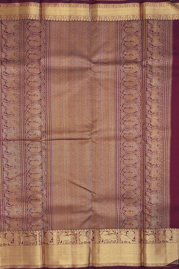 Kanchipuram Silk Saree In Dark Maroon With Parrot Buttas
