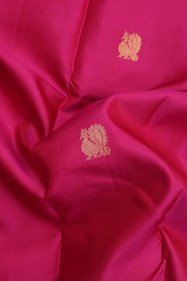 Kanchipuram Silk Saree In Dark Pink With Peacock Buttas