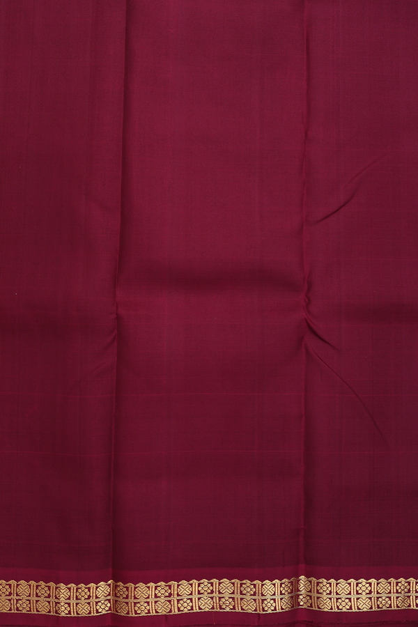 Kanchipuram Silk Saree In Dark Maroon With Zari Border