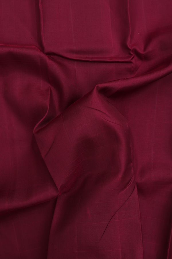 Kanchipuram Silk Saree In Dark Maroon With Zari Border