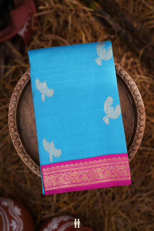 Kanchipuram Silk Saree In Deep Sky Blue With Parrot Buttas