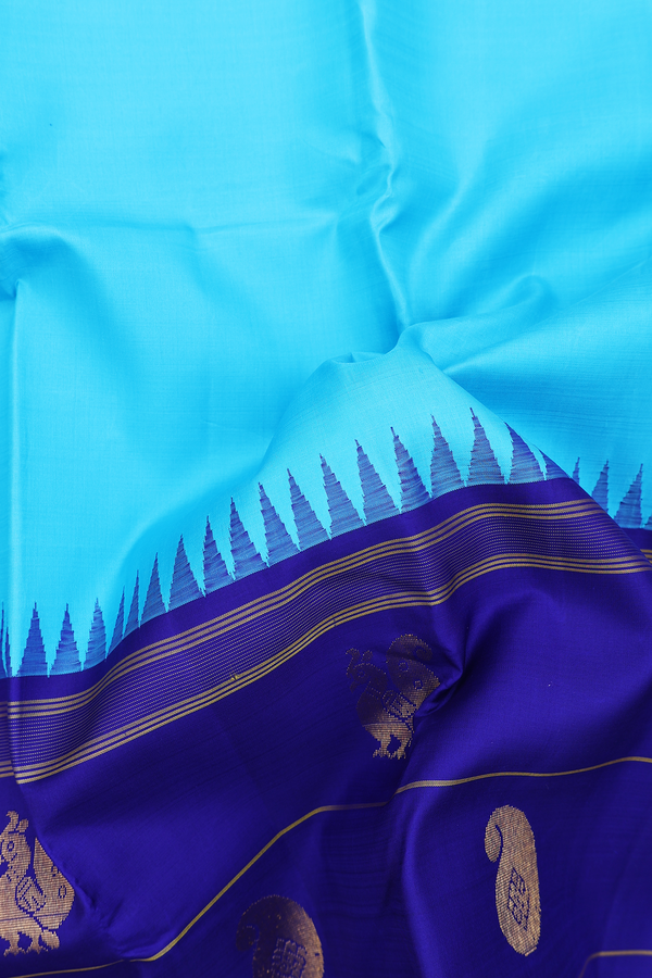 Kanchipuram Silk Saree In Deep Sky Blue With Peacock Border
