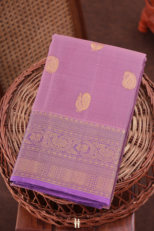 Kanchipuram Silk Saree In Dusty Lavender With Peacock Buttas